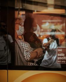 Women on a bus wearing facemasks. Credit: Gender and Covid-19 Working Group