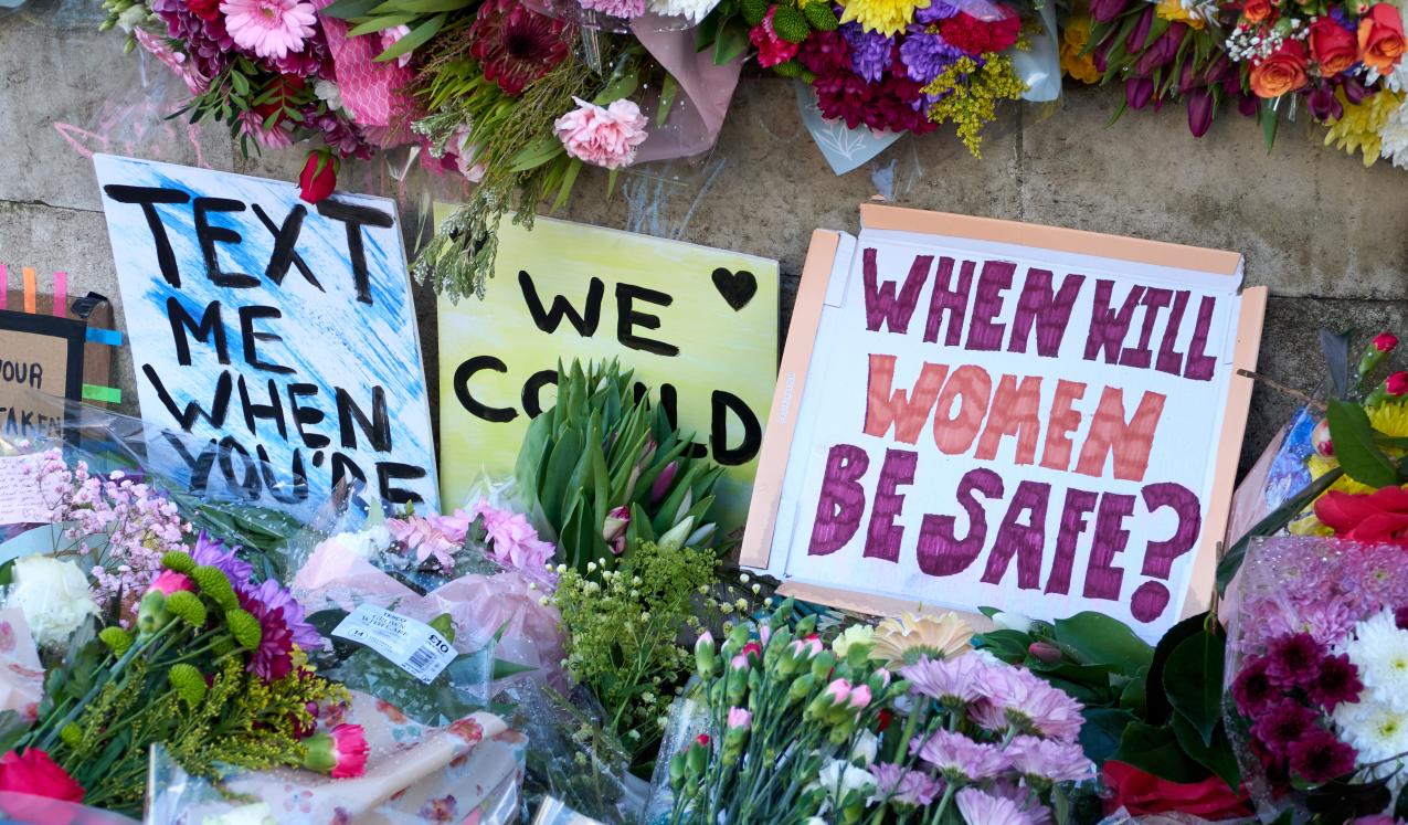 Flowers with messages about women’s safety left by people who attended a vigil for Sarah Everard in Clapham Common. March 2021, London. Credit: Vincenzo Lullo/Shutterstock.com