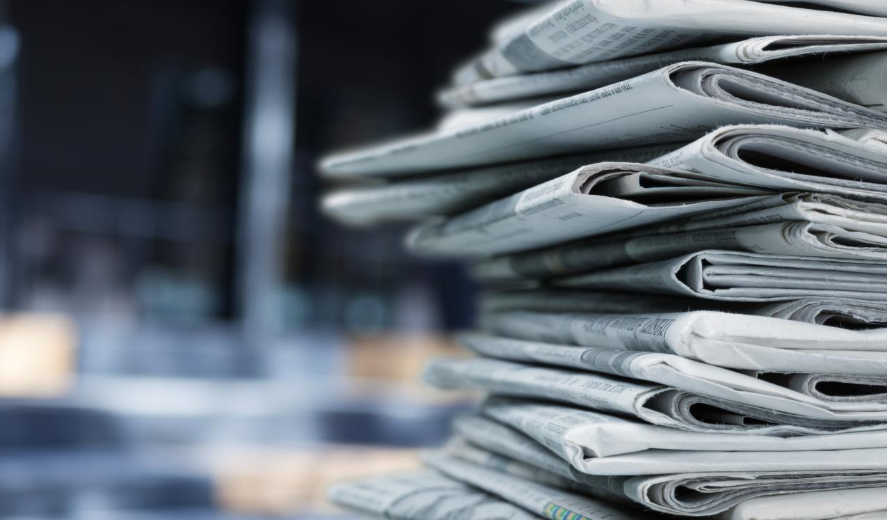 Pile of fresh newspapers. © Billion Photos/Shutterstock/1665903517