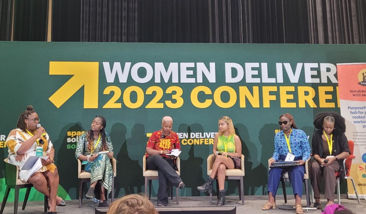 Youth delegates on stage at Women Deliver 2023 ©Natasha Wright