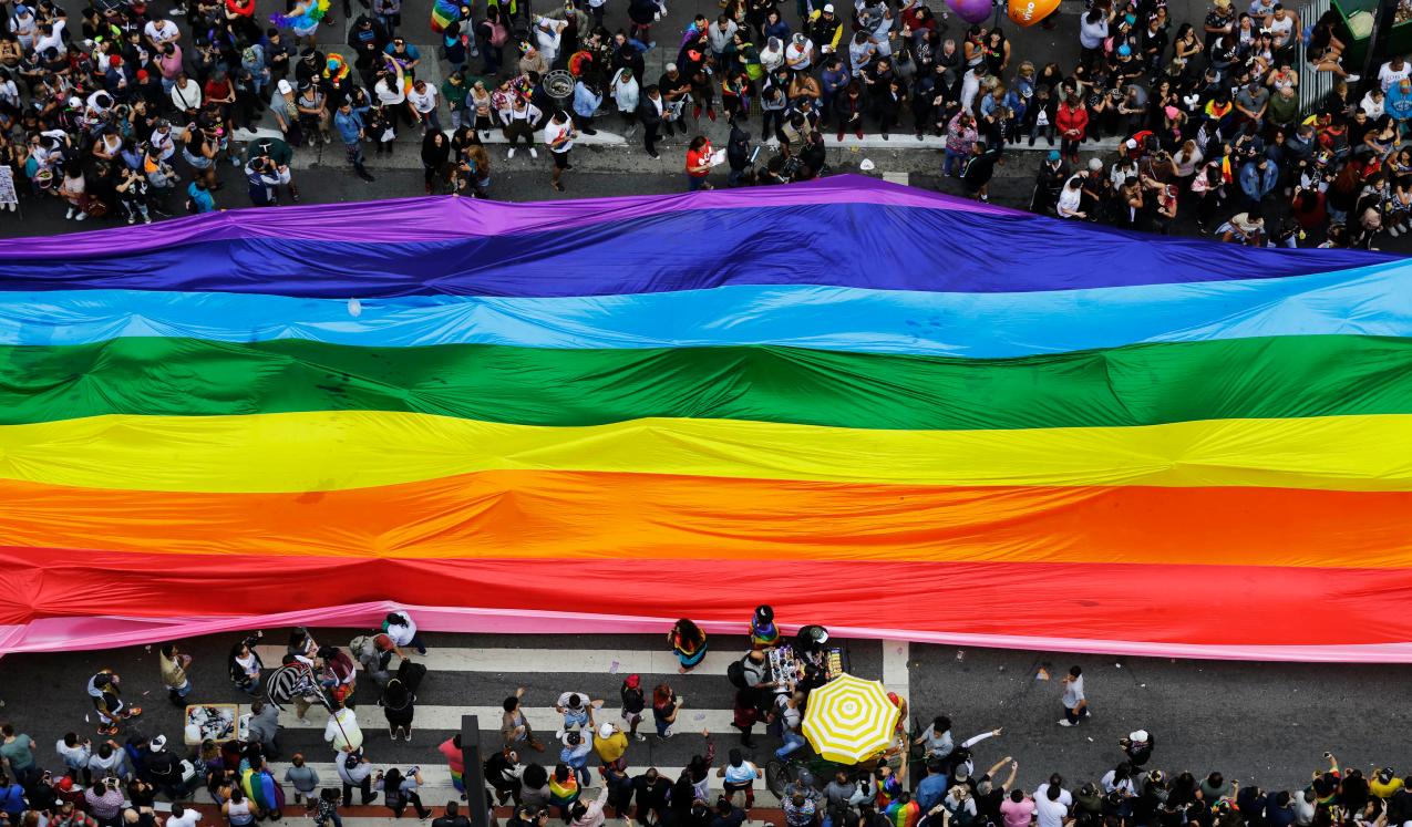 A giant rainbow being carried down the streets during the Pride parade in Sao Paulo, Brazil, 2018. © Nelson Antoine | Shutterstock ID: 1415682524