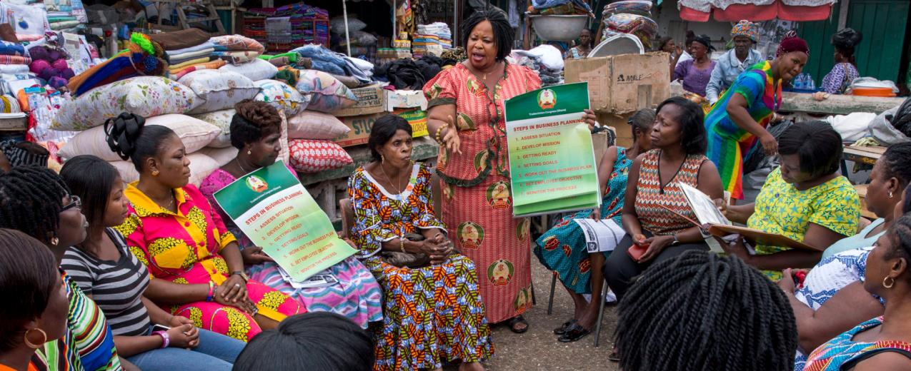 Informal workers gather for a meeting of their association, the Makola Market Traders Union, in Accra, Ghana. The union is dominated by women and the strength in numbers provides some protection to traders. Credit: Jonathan Torgovnik/Getty Images/Images o