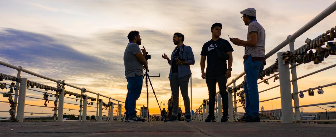 Guanajuato, Mexico, 2019: group of men talking on the famous bridge of love. © Aberu.Go/shutterstock.