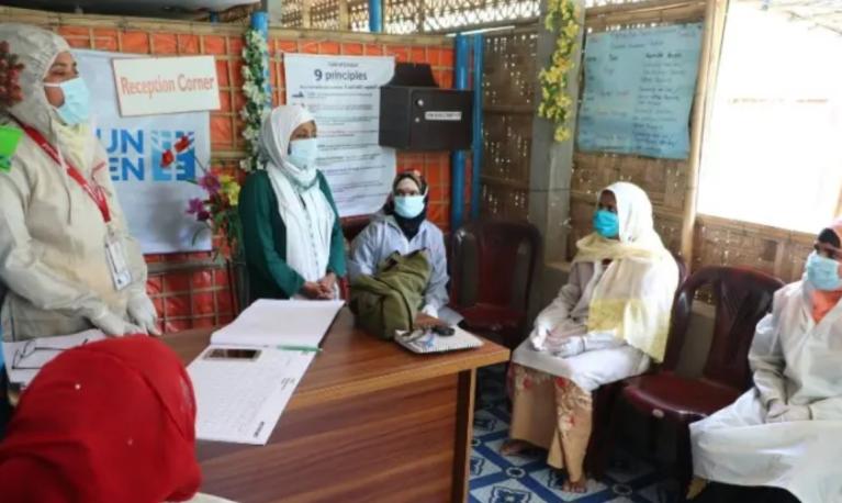 Rohingya volunteers discuss COVID-19-related concerns at a women's center in Cox's Bazar, Bangladesh. Photo by: Marie Sophie Pettersson / UN Women / CC BY-NC-ND