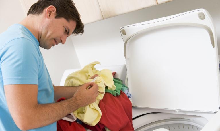 A man doing the laundry. Photograph: Business Images/Rex/Shutterstock