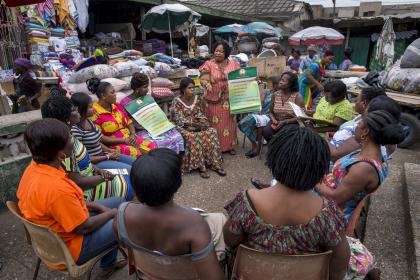 Informal workers gather for a meeting of their association, the Makola Market Traders Union, in Accra, Ghana. The union is dominated by women and the strength in numbers provides some protection to traders. Credit: Jonathan Torgovnik/Getty Images/Images of Empowerment