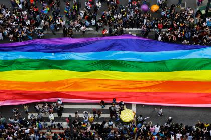 A giant rainbow being carried down the streets during the Pride parade in Sao Paulo, Brazil, 2018. © Nelson Antoine | Shutterstock ID: 1415682524
