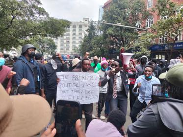 Protesters outside the Nation Centre on Kimathi Street in Nairobi, Kenya, June 2024. © Simon Libz | Shutterstock ID: 2478192113