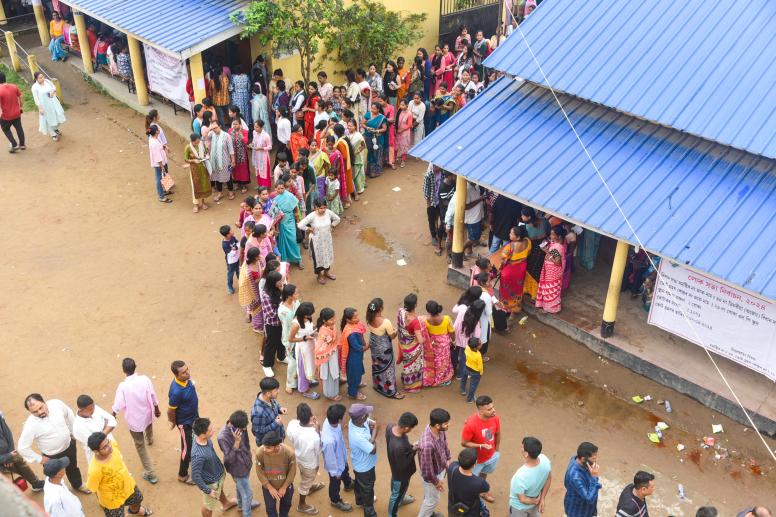 May 2024: people queue to cast their votes at a polling station in Guwahati, India. ©  Hafiz Ahmed | Shutterstock ID: 2460006605