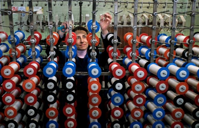 A worker at a silk thread factory in Turkey. Photo: Bulent Suberk, 2016 CGAP Photo Contest